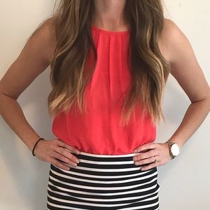 Red/orange sleeveless blouse